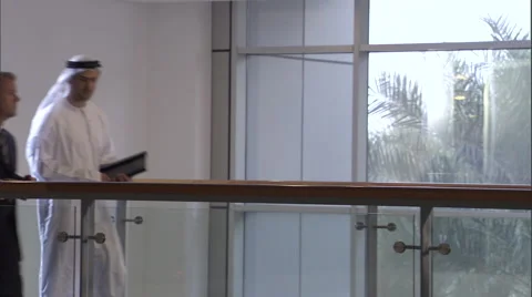 Business professionals walking in an office. Video stock 46868190