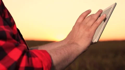 Business program digital tablet. hand finger work in digital tablet. farming Stock Footage 247127898