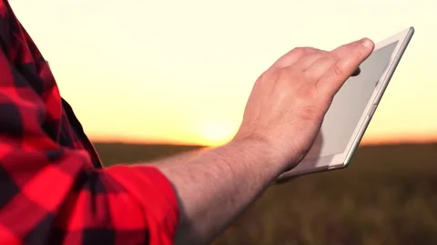Business program digital tablet. hand finger work in digital tablet. farming Stock Footage 247558137