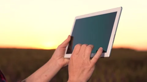 Business program digital tablet. hand finger work in digital tablet. farming Stock Footage 247861488