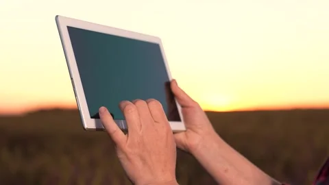 Business program digital tablet. hand finger work in digital tablet. farming Stock Footage 248531691