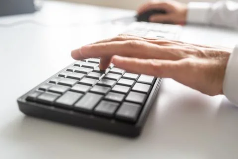 Business programmer using computer keyboard and mouse 스톡 사진