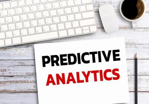 Business quotes, PREDICTIVE ANALYTICS on notebook or paper in office desk, .. Stock Photos