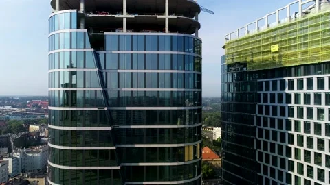 Business skyscraper under construction, aerial view. Modern glass building Stock Footage 159502222