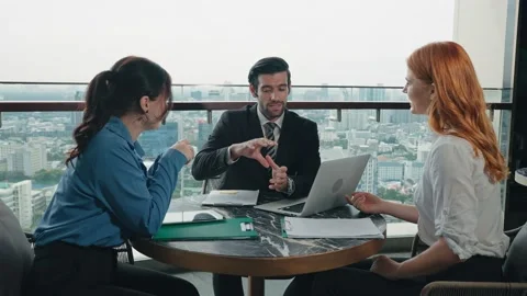 Business startup brainstorm for planning ,using laptop at rooftop Stock Footage 214828980