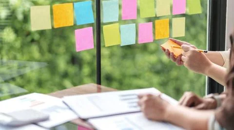Business startup cooperation brainstorming on data documents in modern cre... Stock Photos