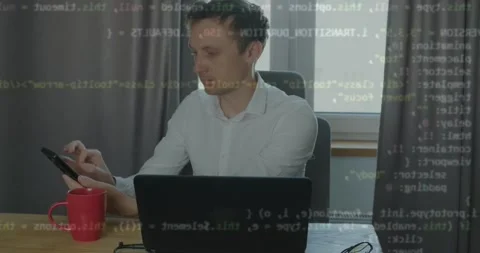 Business student working studying sitting at table and typing script code on Stock Footage 259226325