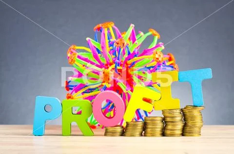 Business success concept, stacking coins and word PROFIT on wooden desk over Stock Photos