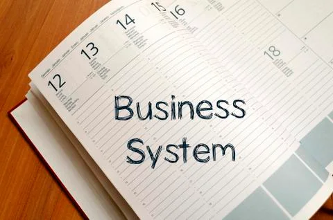 Business system write on notebook Stock Photos