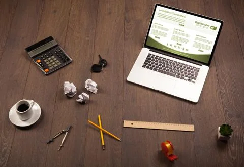Business table with notebook computer and office accessories Foto stock