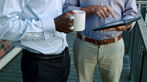 Business tablet discussion Video stock 53082266