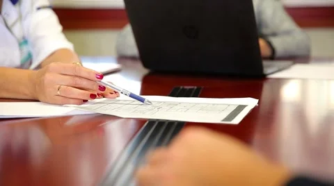 Business team analyzing financial documents Stock Footage 68487678