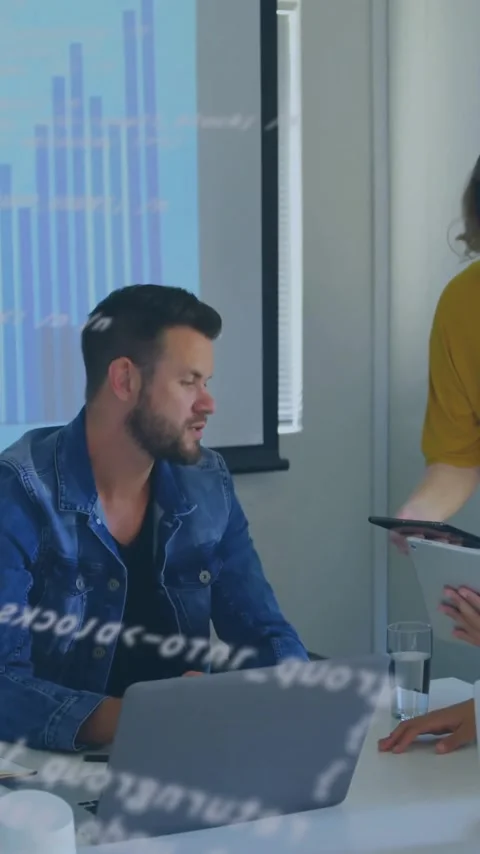 Business team collaborating with digital data animation over office meeting Stock Footage 344244801