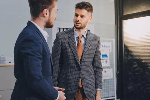 Business team collaborating on digital data analysis in modern office Photos