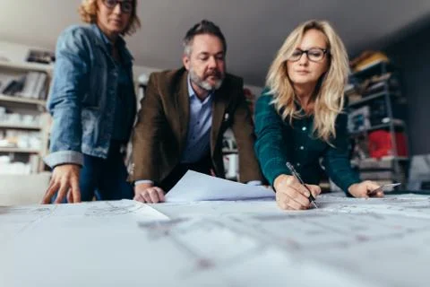 Business team discussing about errors in project Stock Photos