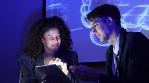 Business team discussing and using AI technology or artificial intelligence Stock Footage 328605484