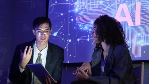 Business team discussing and using AI technology or artificial intelligence Stock Footage 328605487