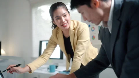 Business Team Discussing Data in Modern Office Stock Footage 341880243