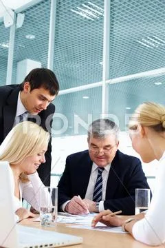 Business team discussing important matters Stock Photos