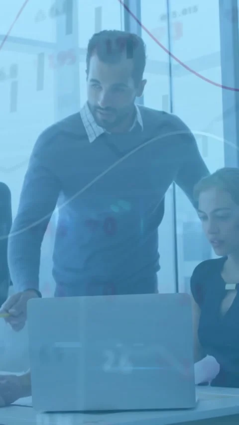 Business team discussing project over financial data animation in office Stock Footage 342015682