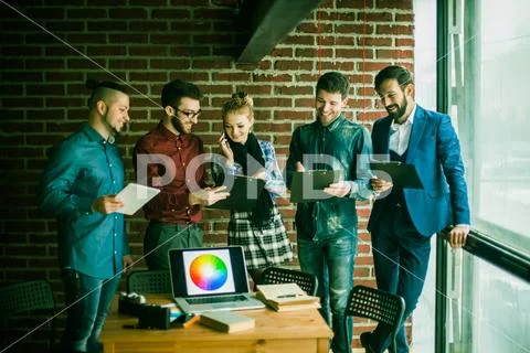 Business team with documents being prepared to discuss the new a Stock Photos