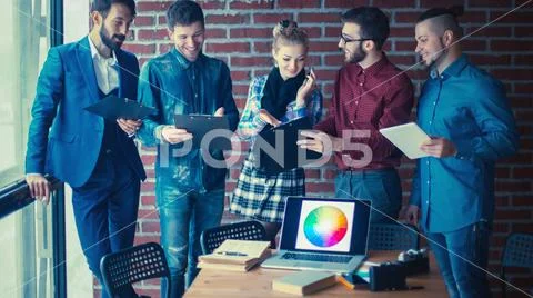 Business team with documents being prepared to discuss the new a Stock Photos