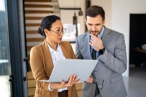 Business team having a meeting in office and solving problem. Teamwork, people Stock Photos
