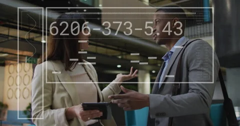 Business team initiating data analysis in office holding tablet with interface 動画素材 314792806