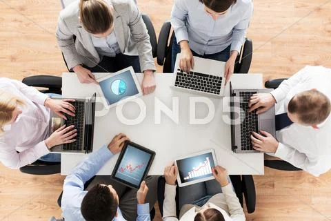 Business Team With Laptop And Tablet Pc