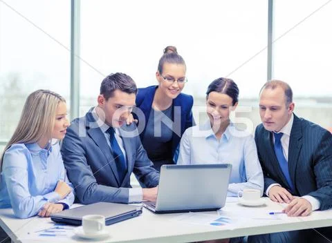 Business team with laptop having discussion Stock Photos
