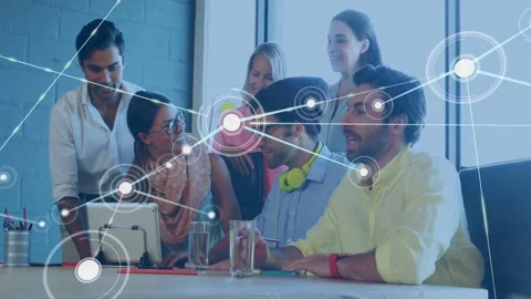 Business team leaning around tablet, woman gesturing and initiating node overlay Stock Footage 333552413