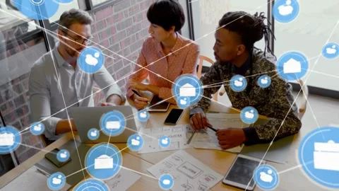 Business team leaning at table while mail icon appearing, growing icon overlay Stock Footage 332901647