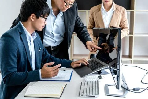 Business team partner working with computer, laptop, discussion and analyzing Stock Photos