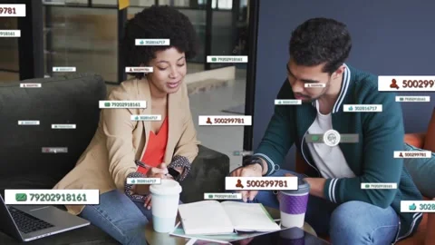 Business team pointing, data tags appearing, clustering near notebook, reducing Stock Footage 322204595