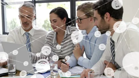 Business team pointing at laptop, interacting and initiating icons expanding Stock Footage 331756939