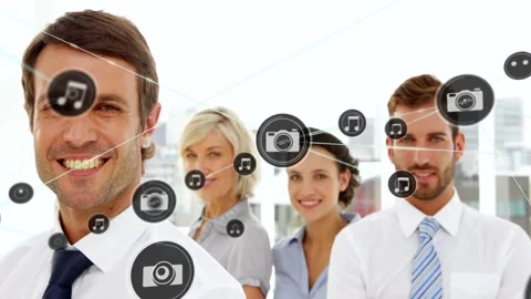Business team posing in office, core camera icon sparking animated icons and Stock Footage 331701081