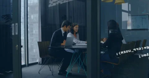 Business team reacting to code overlay exploring laptop data and whiteboard Stock Footage 312083453