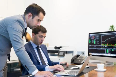 Business team remotely solving a problem at business meeting using laptop Foto stock