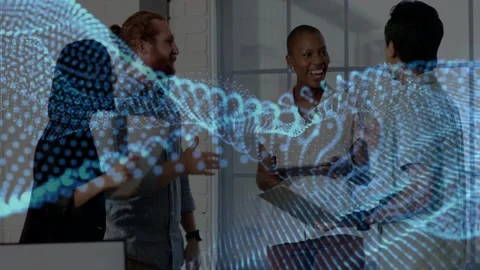 Business team sharing documents after tablet reveal while blue data wave overlay Stock Footage 332666957