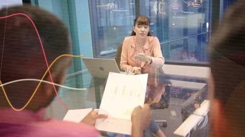 Business team showing bar chart report, spurring manager explaining data and Stock Footage 334014092