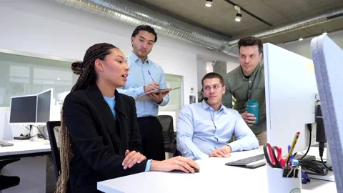 Business team solving problems on computer in office Stock Footage 308464506