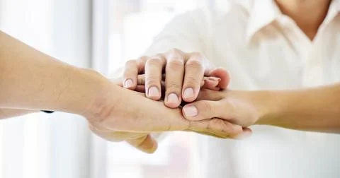 Business Team Stack Hands Support Concept. Four business people in formal w.. Stock Photos