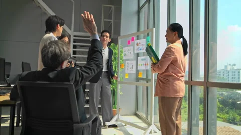 Business team standing and talking during a meeting Stock Footage 339068996
