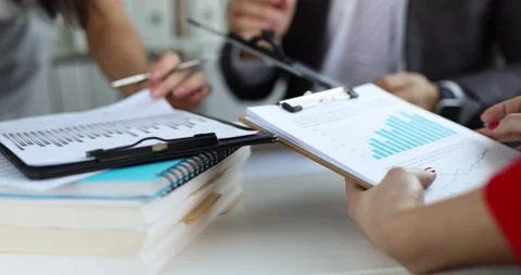 Business team is studying financial analytics in marketing Stock Footage 190022067