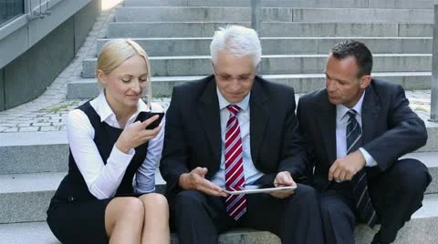 Business team with tablet computer Stock Footage 12233945