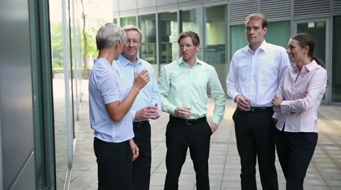 Business team talking outside Stock Footage 53471203