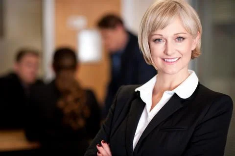 Business team at work, manager in foreground Stock Photos
