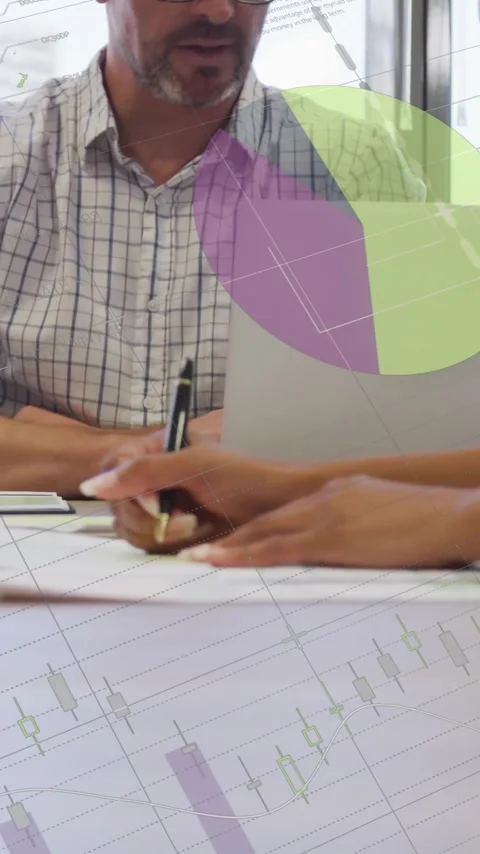 Business team working on documents with data charts animation overlay Stock Footage 344285314