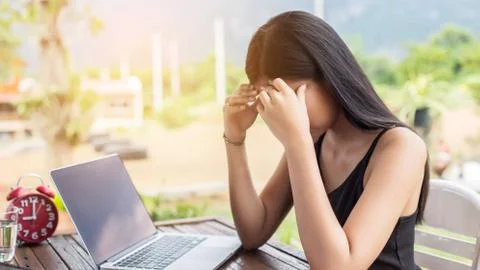 Business team working on laptop, while sitting at office. Business people. Stock Photos