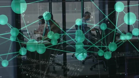 Business team working on laptops at shared desk, displaying animated teal Stock Footage 326298779